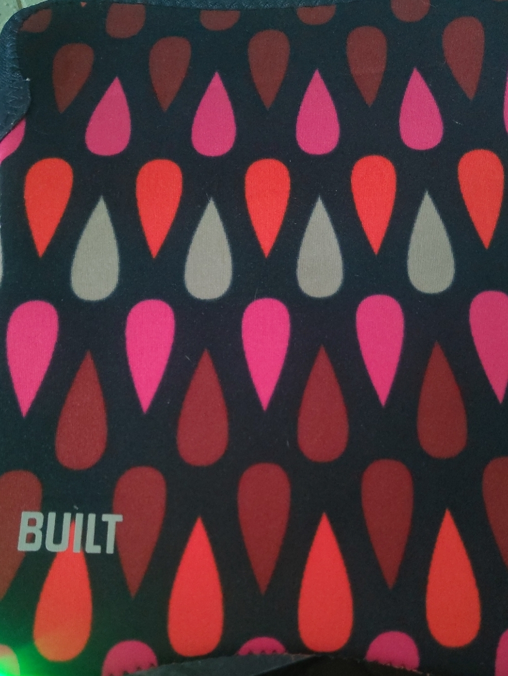BUILT Neoprene Tablet Sleeve in Black with Pink & Red Tear-Drop Pattern